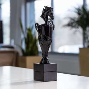 3D printed horse polished and painted in gloss black with a stone base